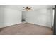 Spacious living room with neutral carpeting and stairs to upper level at 2035 Culloden Dr, Summerville, SC 29483