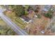Aerial view of a cozy single-story home with mature trees and nearby road access at 206 Dukes St, Saint George, SC 29477