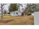 Spacious backyard featuring a shed, seating area, and lush green grass at 206 Dukes St, Saint George, SC 29477