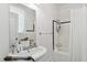 Clean bathroom with a bathtub, shower, and white tile at 212 Calhoun, Charleston, SC 29401