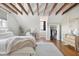 Bedroom with exposed wooden beams, hardwood floors and closet at 212 Calhoun, Charleston, SC 29401