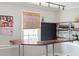 Home bar with wood countertop, shelving, and chalkboard at 212 Calhoun, Charleston, SC 29401