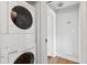 Stackable washer and dryer in a small laundry room at 212 Calhoun, Charleston, SC 29401