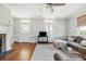 Living Room with hardwood floors, sectional sofa and fireplace at 212 Calhoun, Charleston, SC 29401