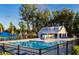 Inviting community pool with cabana and lounge chairs at 2202 St Johns Woods Pkwy, Johns Island, SC 29455