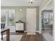 Bright entryway with wood floors, a shoe cabinet, and access to other rooms at 2202 St Johns Woods Pkwy, Johns Island, SC 29455