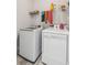 Laundry room with side-by-side washer and dryer and overhead shelving at 2202 St Johns Woods Pkwy, Johns Island, SC 29455