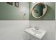 Charming powder room with green walls and white subway tile at 2202 St Johns Woods Pkwy, Johns Island, SC 29455