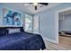 Light blue bedroom with double bed and access to another room at 2268 Bailey Dr, North Charleston, SC 29405