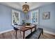 Bright dining room with wooden table and blue walls at 2268 Bailey Dr, North Charleston, SC 29405