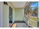 Inviting front porch with white railing and door at 2268 Bailey Dr, North Charleston, SC 29405