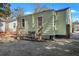 Light green house exterior with landscaping and AC unit at 2268 Bailey Dr, North Charleston, SC 29405
