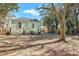 House exterior with light green siding and a backyard at 2268 Bailey Dr, North Charleston, SC 29405
