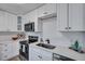 Updated kitchen, white cabinets, quartz countertops, stainless steel appliances at 2268 Bailey Dr, North Charleston, SC 29405