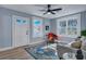 Light and airy living room with a gray sofa and area rug at 2268 Bailey Dr, North Charleston, SC 29405