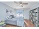Spacious bedroom with a large bookcase and sliding glass doors at 2311 Tall Sail Dr # B, Charleston, SC 29414