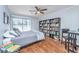 Bright bedroom with built-in bookshelves and sliding glass doors at 2311 Tall Sail Dr # B, Charleston, SC 29414
