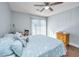 Bedroom features a ceiling fan, sliding glass doors, and dresser at 2311 Tall Sail Dr # B, Charleston, SC 29414