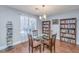 Dining area with glass table and chairs, hardwood floors at 2311 Tall Sail Dr # B, Charleston, SC 29414