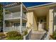 Two-story condo building with balconies and a walkway at 2311 Tall Sail Dr # B, Charleston, SC 29414