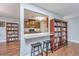 Open kitchen features granite countertops, stainless steel appliances, and wood cabinetry at 2311 Tall Sail Dr # B, Charleston, SC 29414