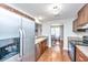 Kitchen boasts stainless steel appliances and wood cabinets at 2311 Tall Sail Dr # B, Charleston, SC 29414