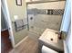 Modern bathroom with a tub/shower combo and updated vanity at 235 Blossom St, Goose Creek, SC 29445