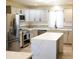 Renovated kitchen with stainless steel appliances and large island at 235 Blossom St, Goose Creek, SC 29445