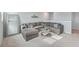 Spacious bonus room featuring a sectional sofa and a large mirror at 261 Firewheel Ct, Summerville, SC 29486