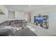 Relaxing bonus room, sectional sofa, and entertainment center at 261 Firewheel Ct, Summerville, SC 29486