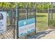 Fenced dog park with signage and ample space for pets to play at 261 Firewheel Ct, Summerville, SC 29486