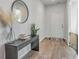 Bright entryway with console table, mirror, and wood flooring at 261 Firewheel Ct, Summerville, SC 29486