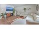 Open living room showcasing a sectional sofa, wood floors, and stylish decor at 261 Firewheel Ct, Summerville, SC 29486