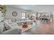 Open floor plan with living area, kitchen, and dining space at 261 Firewheel Ct, Summerville, SC 29486