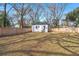 View of the backyard featuring a shed and a wooden fence at 2889 Alabama Drive, North Charleston, SC 29405