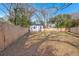 View of the backyard featuring a shed and a wooden fence at 2889 Alabama Drive, North Charleston, SC 29405