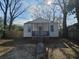 Charming white bungalow with front porch and fenced yard at 2889 Alabama Drive, North Charleston, SC 29405