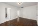 An open living room with gleaming hardwood floors and bright natural light at 2889 Alabama Drive, North Charleston, SC 29405
