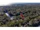 Aerial view showcasing home's location near water and lush greenery at 2908 Old Drake Dr, Seabrook Island, SC 29455