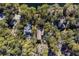 Aerial view showing the home's location in a quiet, wooded neighborhood at 2908 Old Drake Dr, Seabrook Island, SC 29455