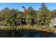Waterfront property nestled in a lush, wooded area at 2908 Old Drake Dr, Seabrook Island, SC 29455