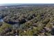 Aerial view showing house's location near water and trees at 2908 Old Drake Dr, Seabrook Island, SC 29455