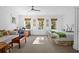 Bedroom with twin beds, workspace, and window views at 2908 Old Drake Dr, Seabrook Island, SC 29455