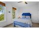 Blue and white bedroom with leafy window view at 2908 Old Drake Dr, Seabrook Island, SC 29455