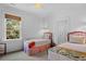 Cozy bedroom with two twin beds and natural light at 2908 Old Drake Dr, Seabrook Island, SC 29455