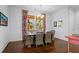 Light-filled dining room featuring a charming table and wicker chairs at 2908 Old Drake Dr, Seabrook Island, SC 29455