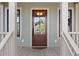 Elegant front door with a glass pane design, leading to a porch at 2908 Old Drake Dr, Seabrook Island, SC 29455