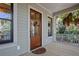 Elegant front door with a glass pane design, leading to a porch at 2908 Old Drake Dr, Seabrook Island, SC 29455