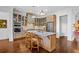 Bright kitchen with island, stainless steel appliances & custom cabinetry at 2908 Old Drake Dr, Seabrook Island, SC 29455