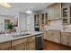 Modern kitchen with island, stainless steel appliances, and custom cabinets at 2908 Old Drake Dr, Seabrook Island, SC 29455